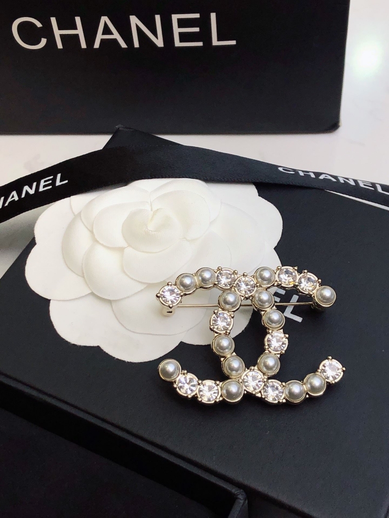 Ch**el brooches